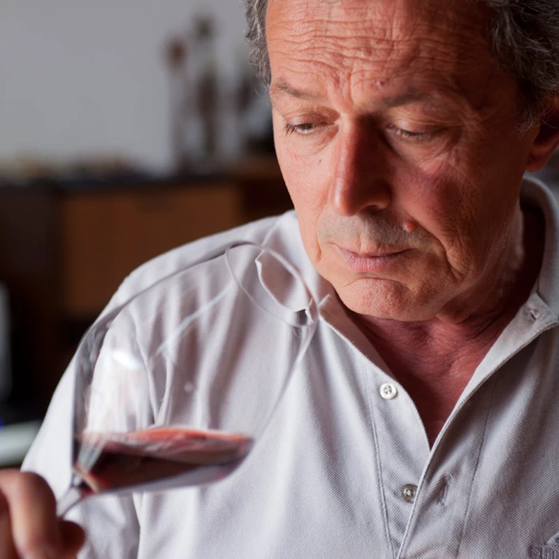 Ugo Lequio tasting his wine